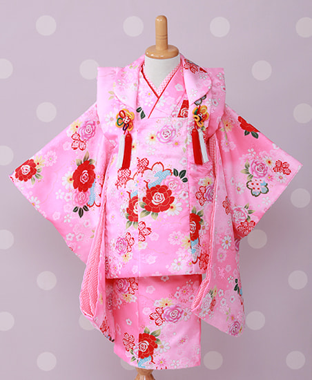 ピンクに共の柄の被布の着物